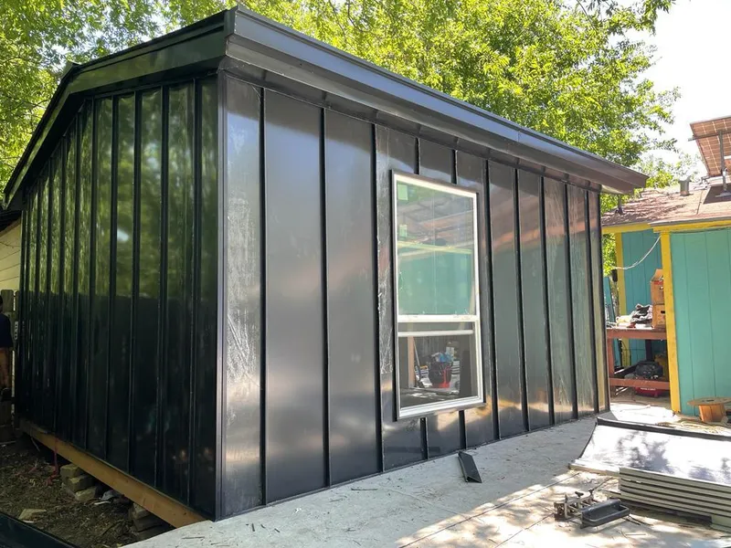 Black standing seam metal wall panels for Metal Roof Installation in Kingsbury